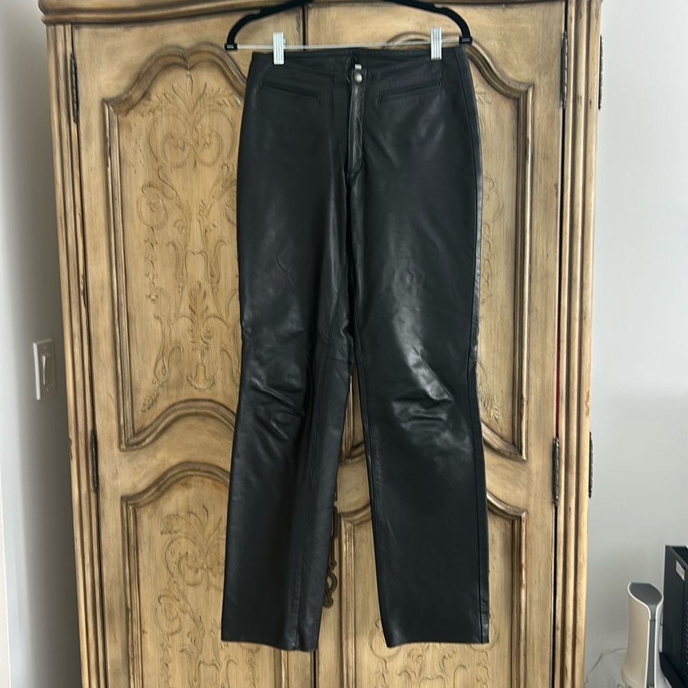 Genuine leather boot cut .. purchased in Argentina. unsure of size prob 4